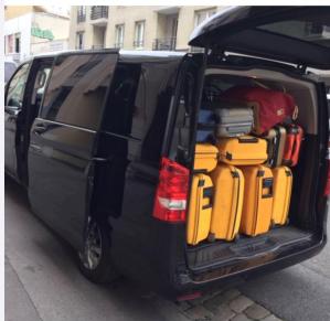 Transport et garde de bagages dans un van avec un chauffeur sur lyon